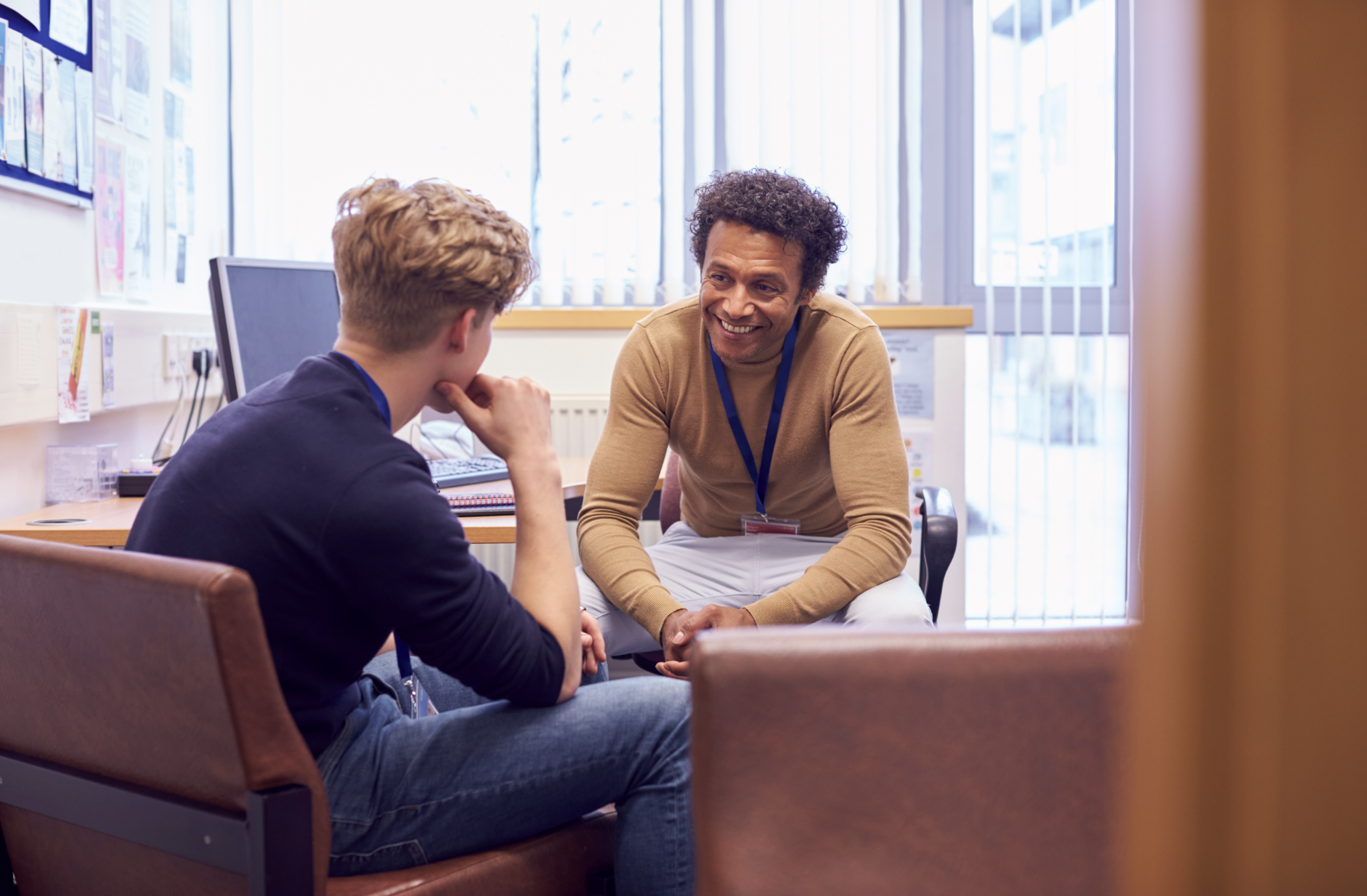 student talking with counselor