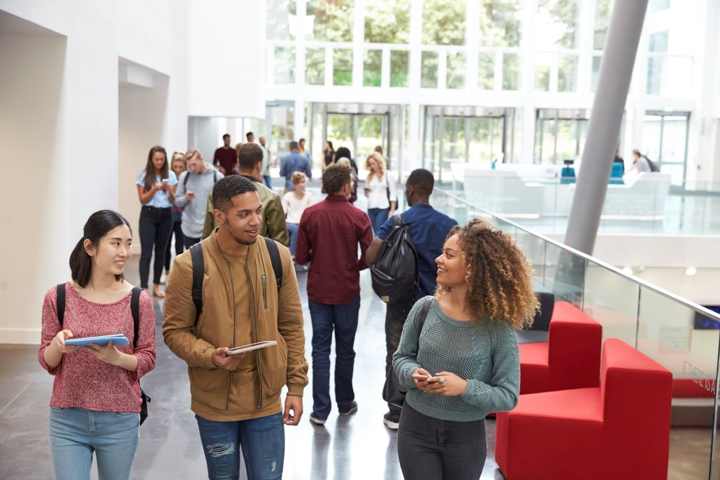 Students walking through a college building