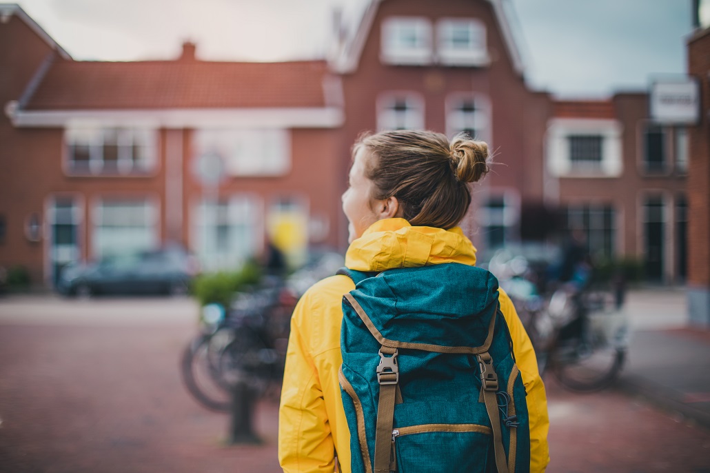 Independent student walking on college campus