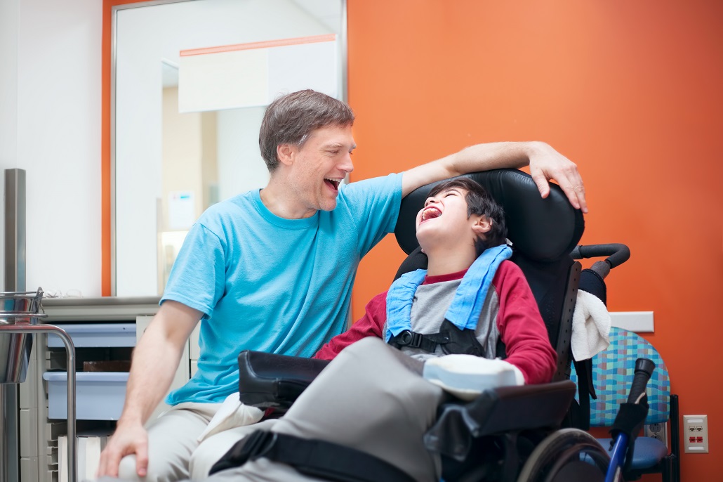 Father laughing with son