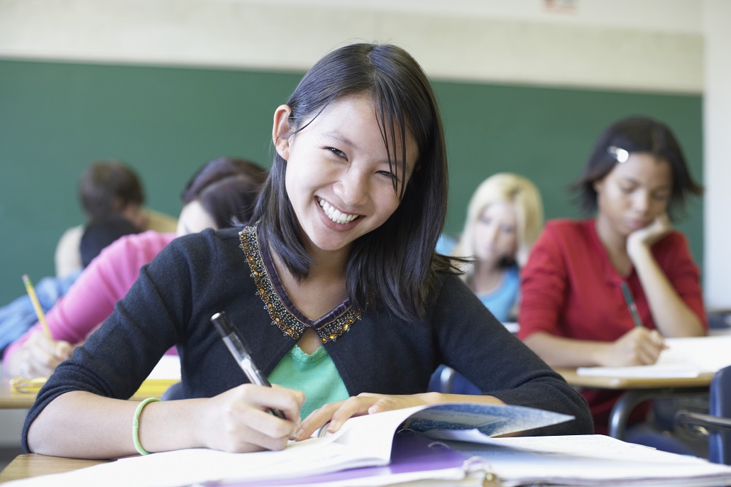 Student taking notes