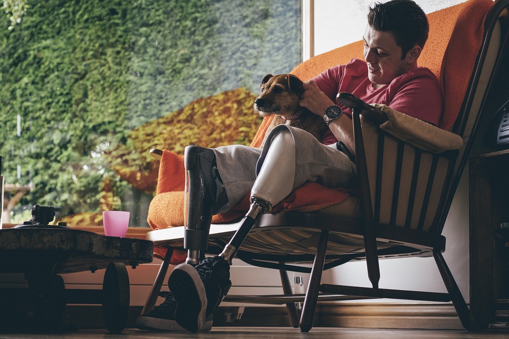 Man sitting with his dog