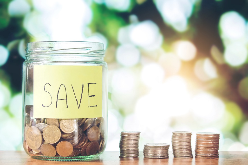 Jar of coins for Back to School College Savings