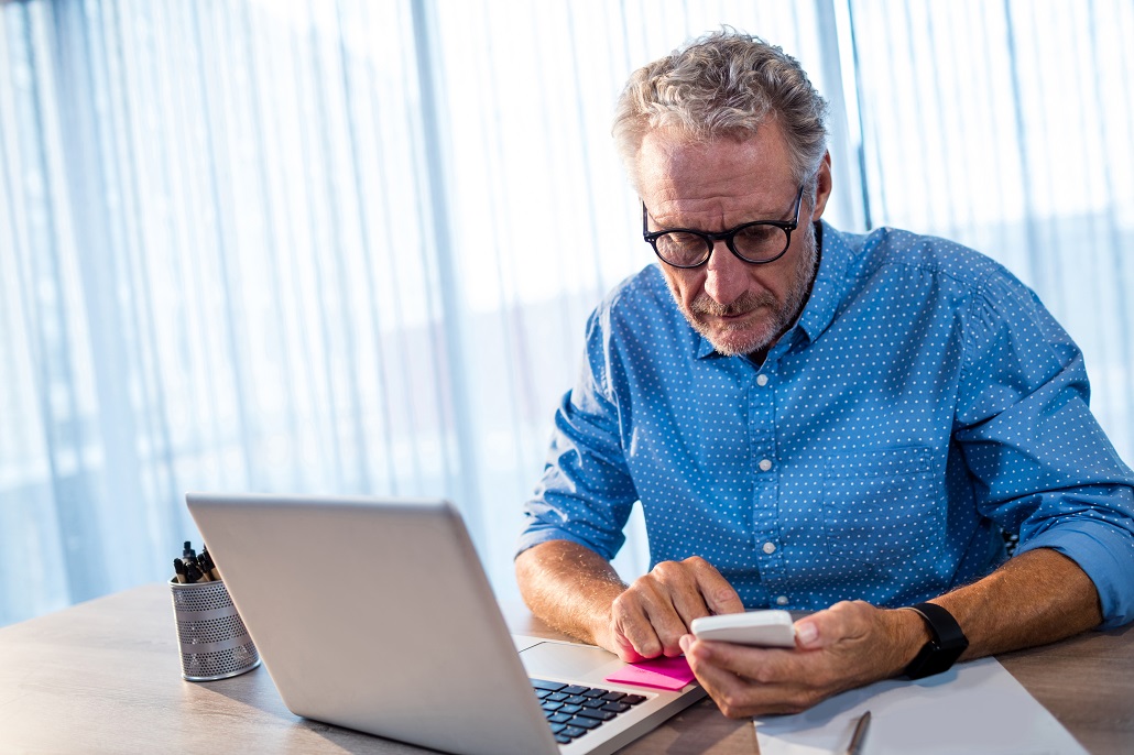 man using laptop