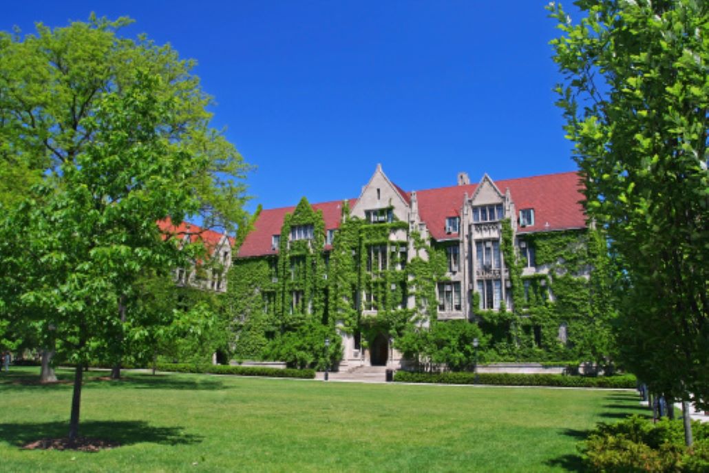 College campus with green lawn and trees