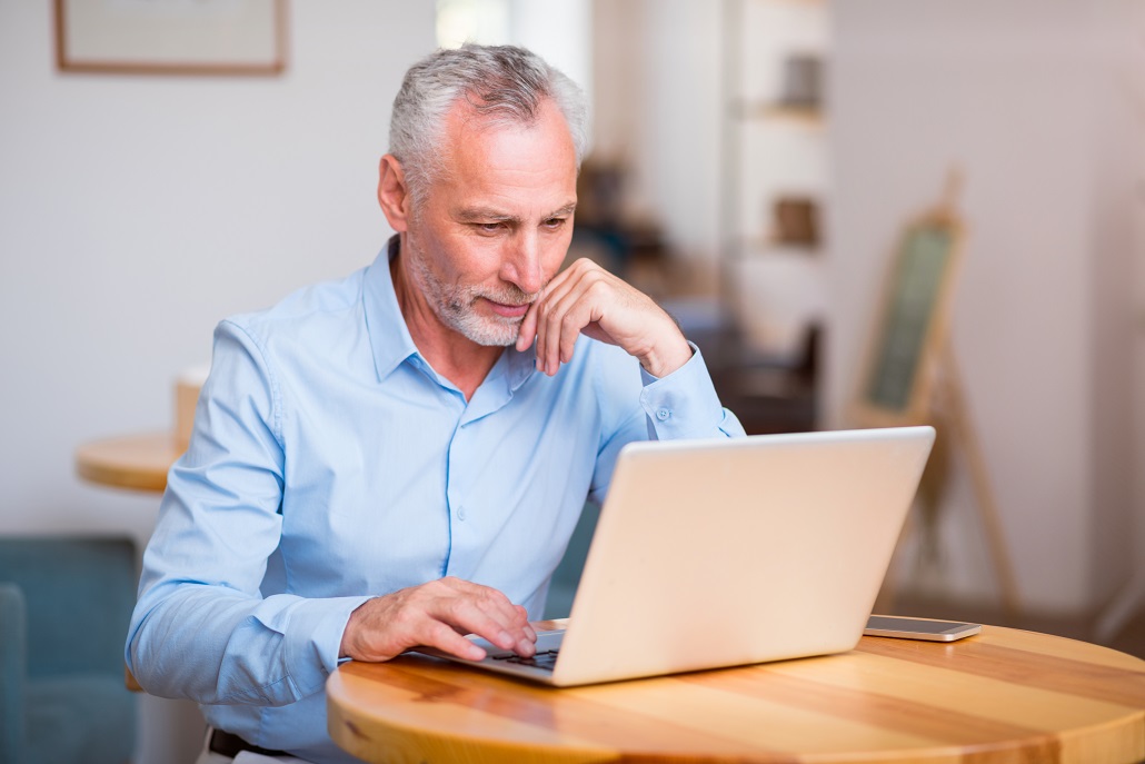 man using laptop