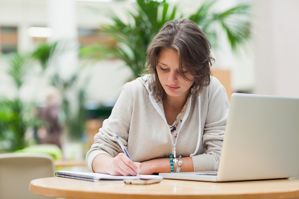 Student using laptop to apply to community college