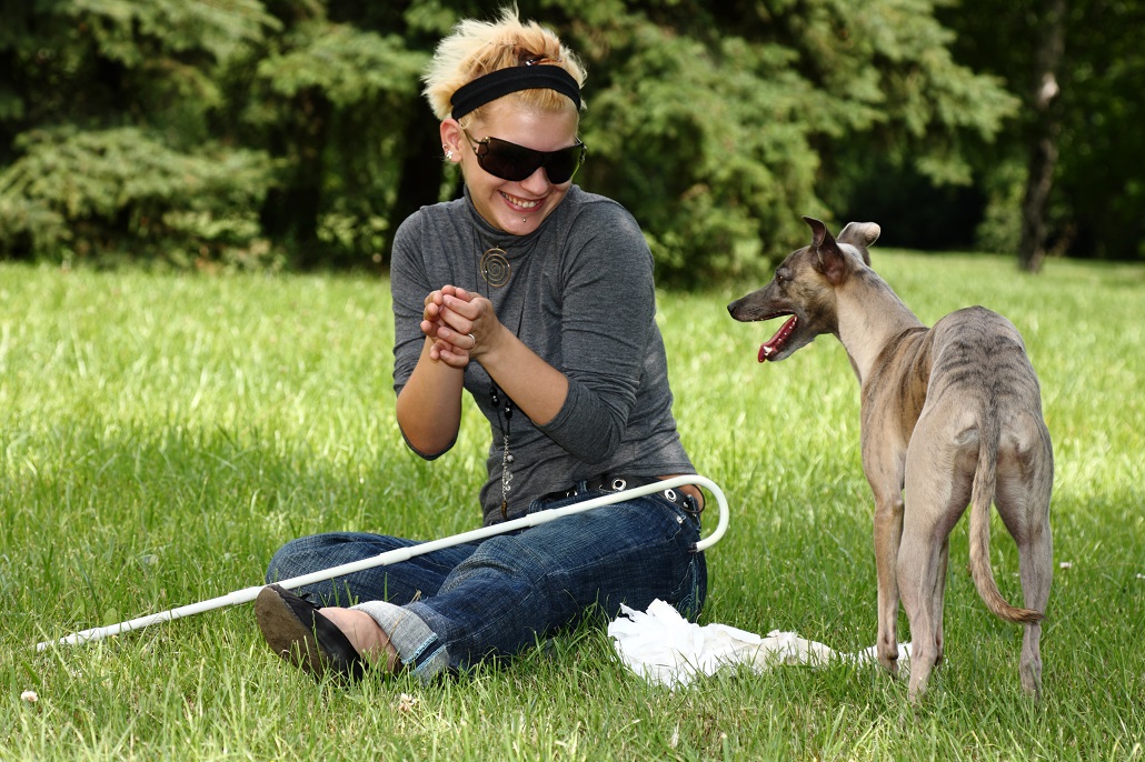 Woman sitting with dog