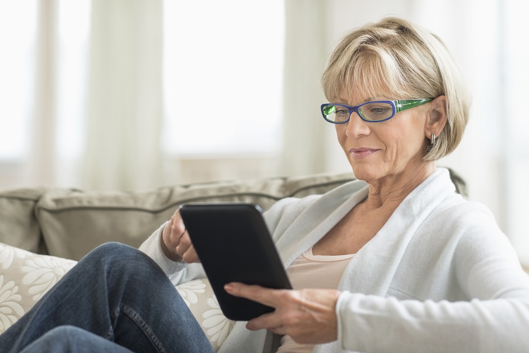 Woman using tablet to learn about student loans
