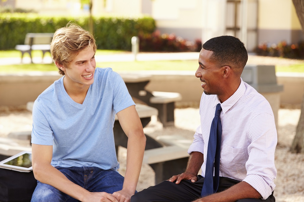 Student working with school counselor