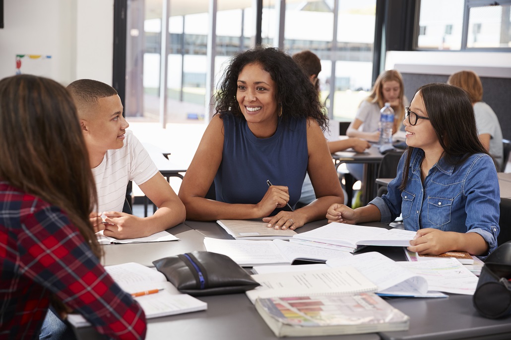 Counselor working with students