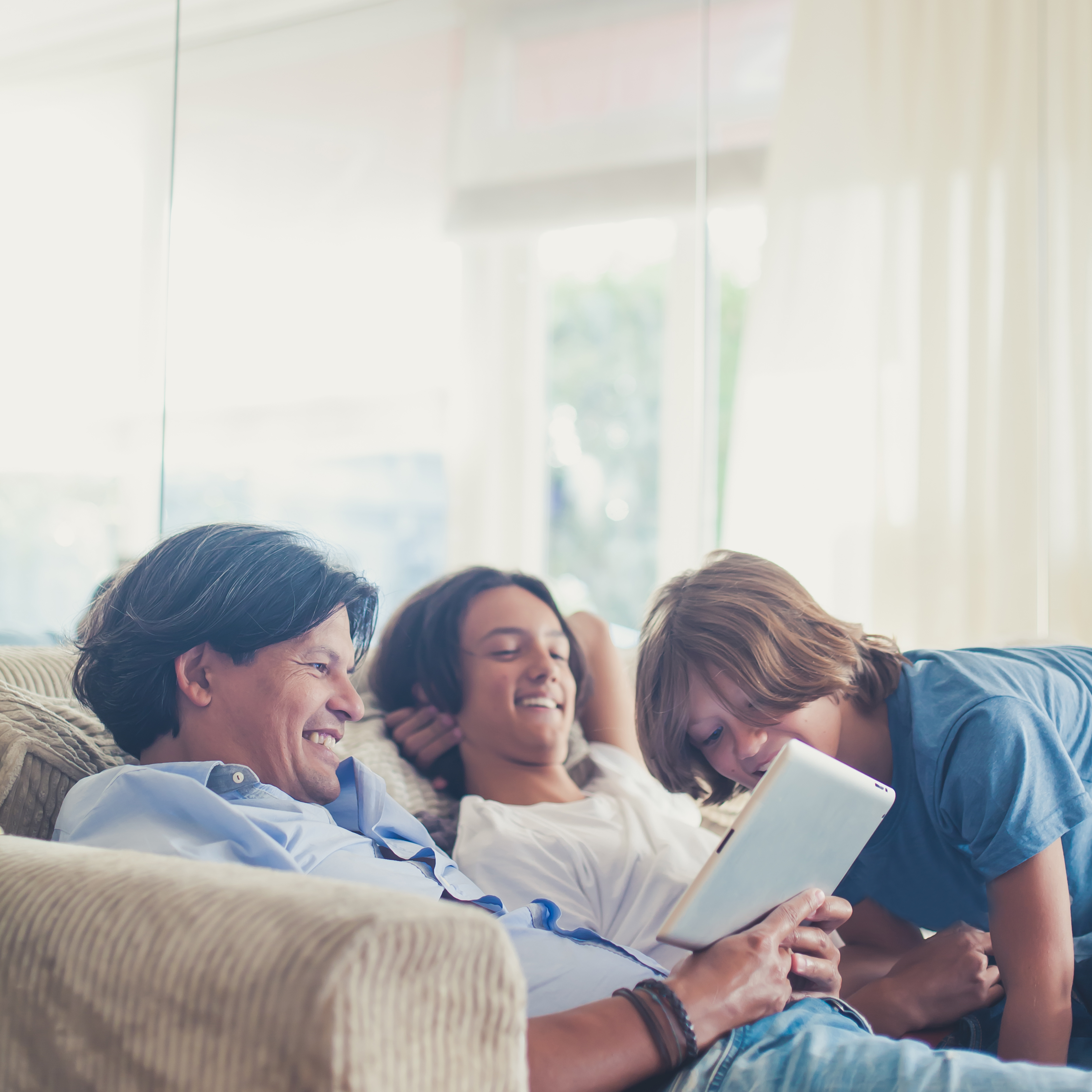 A family looking at their U.Plan Prepaid Tuition Program savings