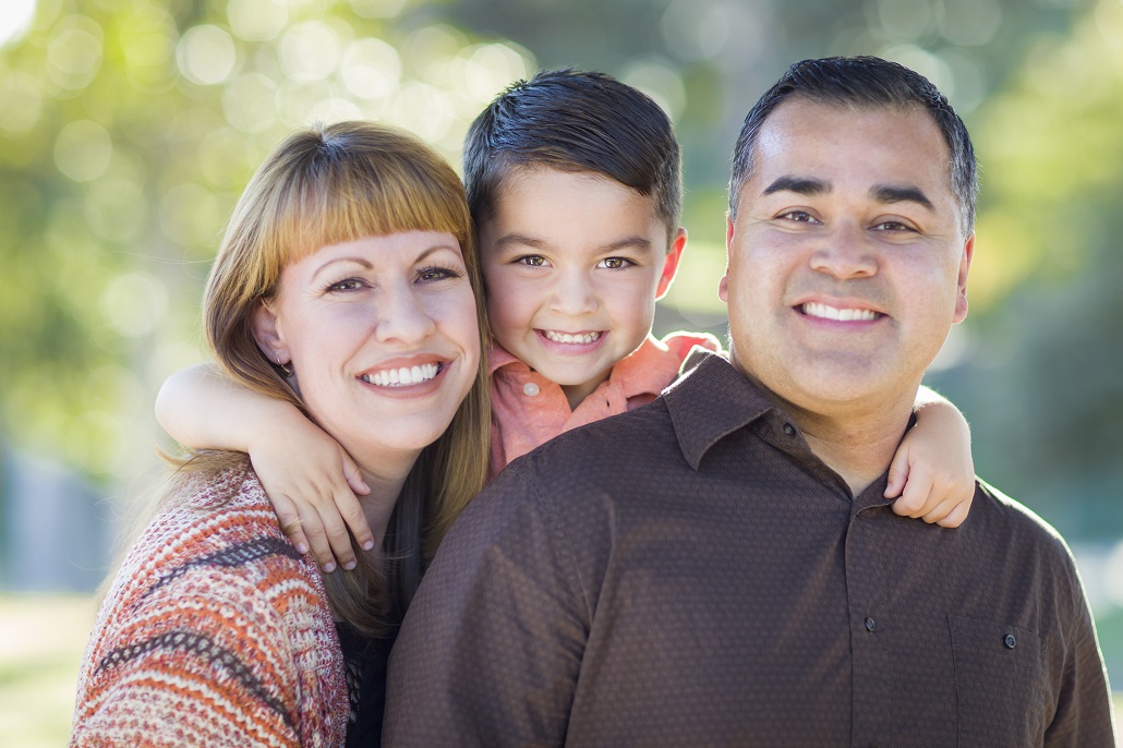 A family smiling for the camera