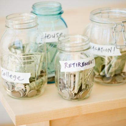 Jars of money for saving for college