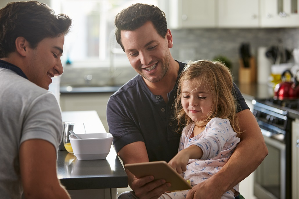 Parents and child learning about 529 savings plans