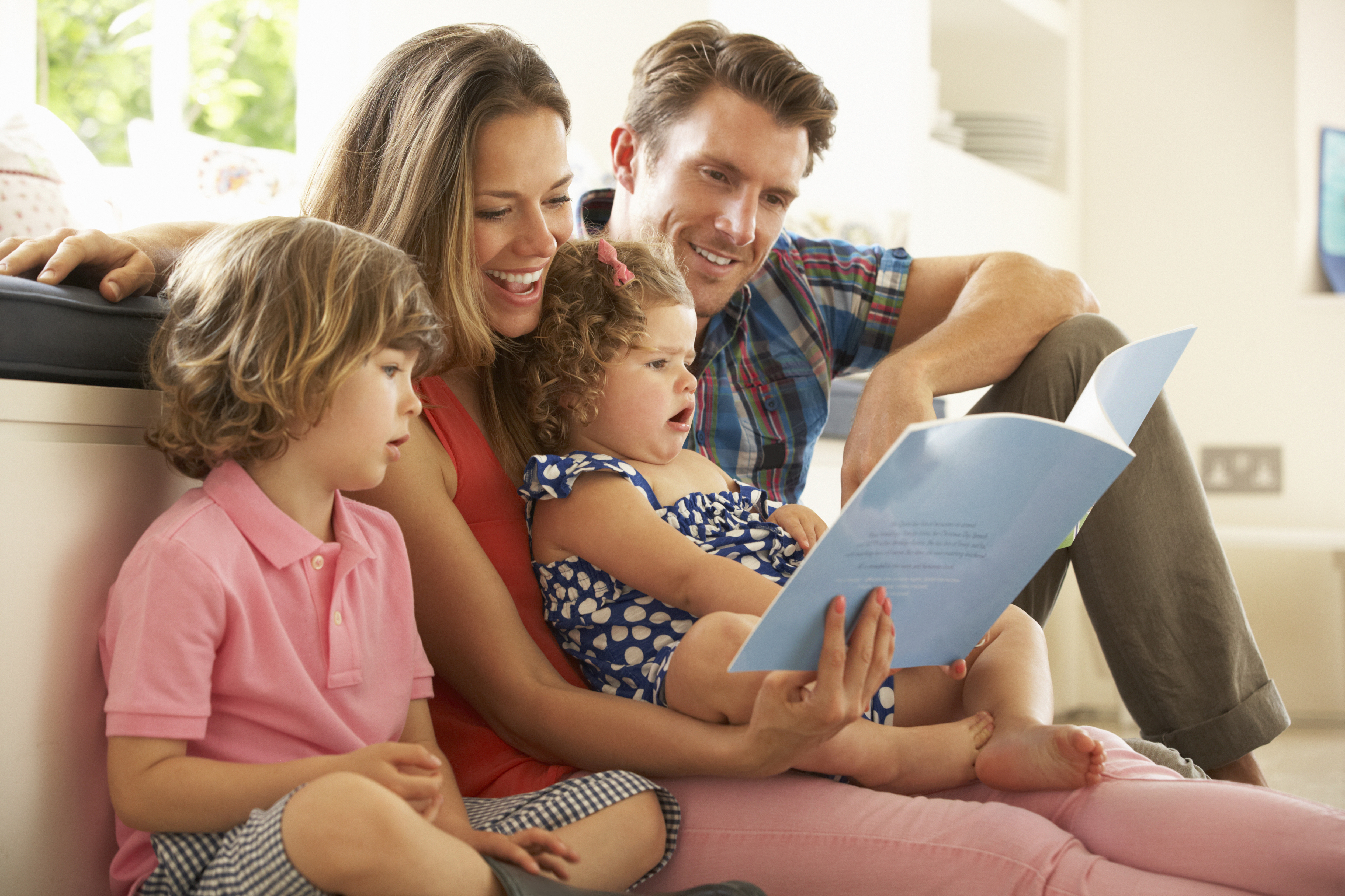 A family reading a book