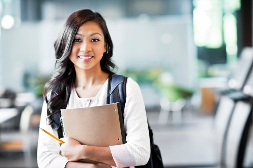 A student holding books