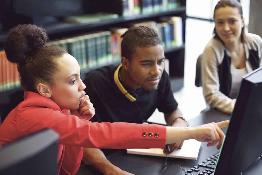 Group looking at computer screen